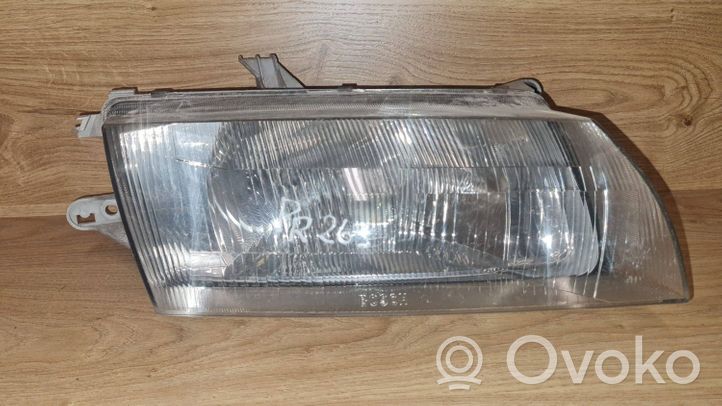 Mazda 323 Lampa przednia 1305235337