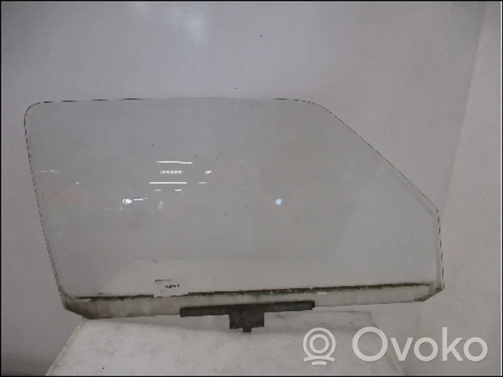 Volkswagen Golf II Front door window glass four-door 191845202C