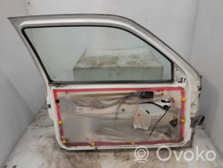 Volkswagen Golf III Portiera anteriore 1H3831055A