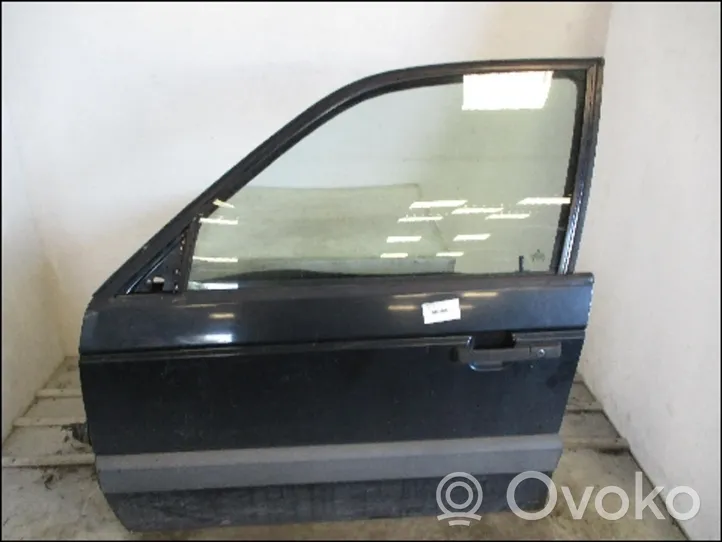 Volkswagen PASSAT B4 Drzwi przednie 357831051F