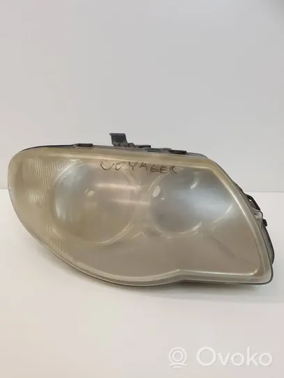 Chrysler Voyager Lampa przednia 04857830AC