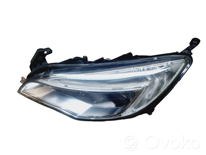 Opel Astra J Lampa przednia 1LG01001103