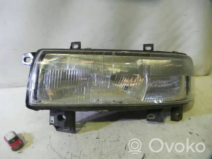 Opel Movano A Lampa przednia 7700352103C