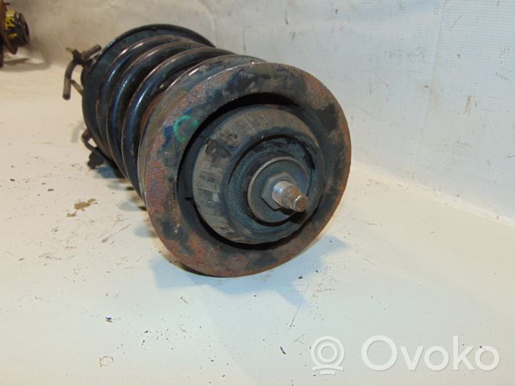 Opel Omega B1 Front shock absorber with coil spring 90447370