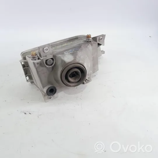 Ford Orion Phare frontale 654464514