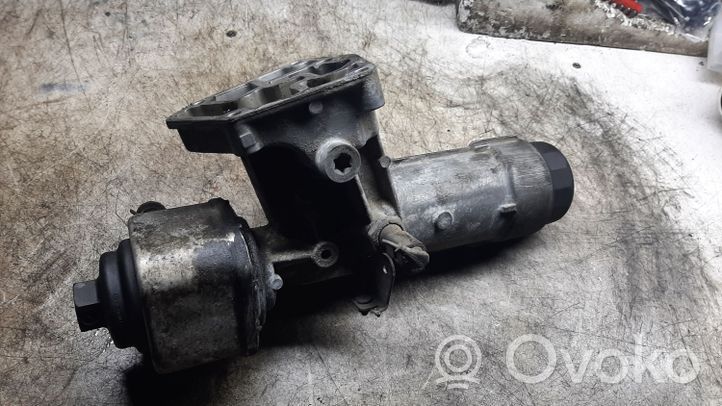 Volkswagen Sharan Supporto di montaggio del filtro dell’olio 038115389C