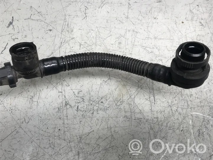 Opel Astra J Tubo flessibile del liquido di raffreddamento del motore 55569363