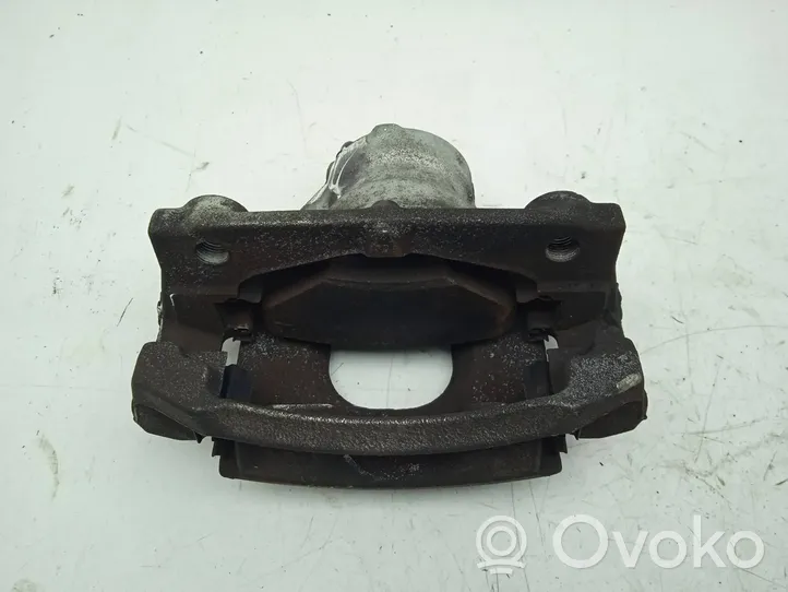 Toyota Aygo AB40 Zacisk hamulcowy przedni Y01786