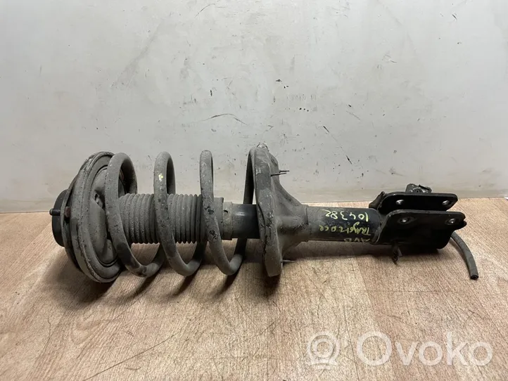 Hyundai Trajet Front shock absorber with coil spring 546603A201