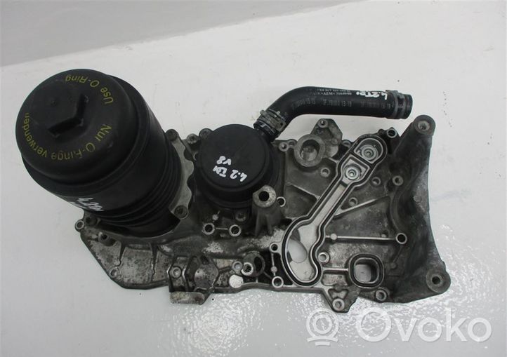 Volkswagen Touareg II Supporto di montaggio del filtro dell’olio 057115401AK