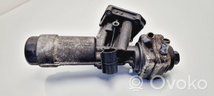 Volkswagen Golf IV Supporto di montaggio del filtro dell’olio 038115389C