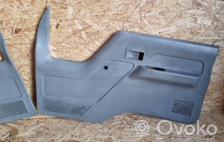 Mitsubishi Canter Front door card panel trim MB394645