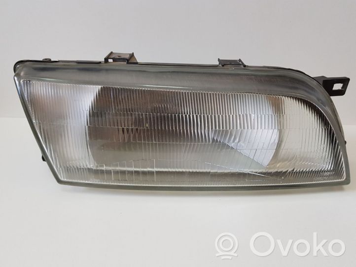 Nissan Almera Faro delantero/faro principal 4738