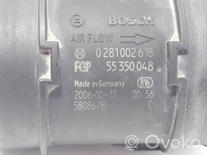 Opel Corsa D Przepływomierz masowy powietrza MAF 0281002618