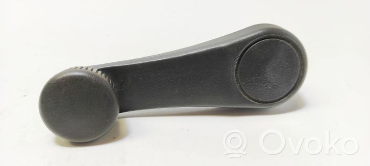 KIA Clarus Rear door window winding handle 