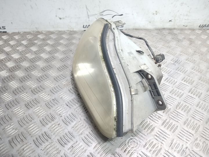 KIA Clarus Phare frontale 0K9B051030