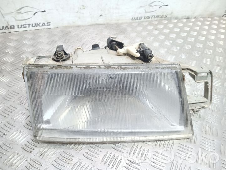 Fiat Tempra Lampa przednia 45114