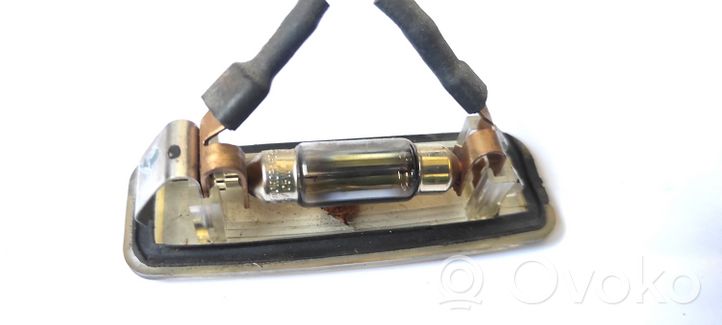 Ford Focus Lampa oświetlenia tylnej tablicy rejestracyjnej XS4X13550A