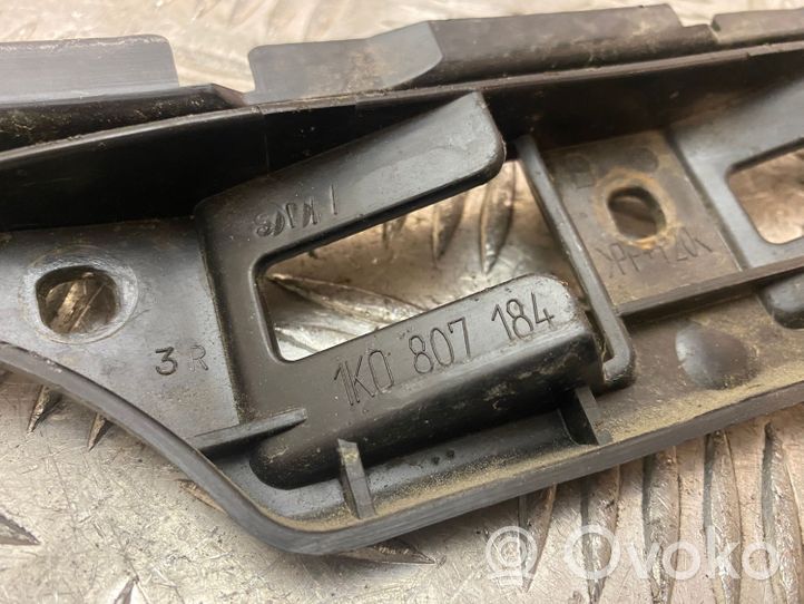 Volkswagen Golf V Supporto di montaggio del parafango 1K0807184