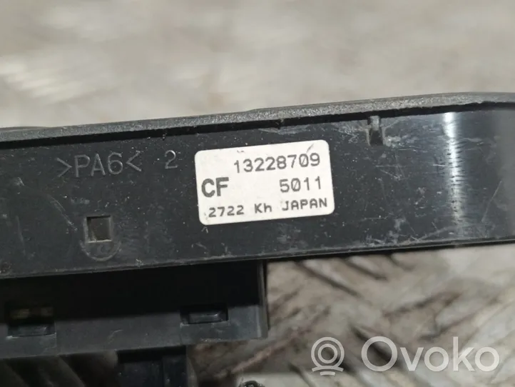 Opel Zafira B Interruptor del elevalunas eléctrico 13228709