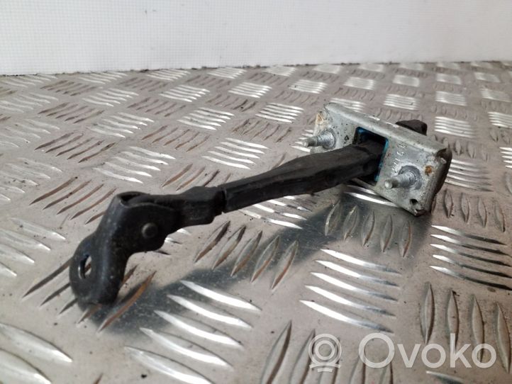 Opel Astra J Front door check strap stopper 13363546