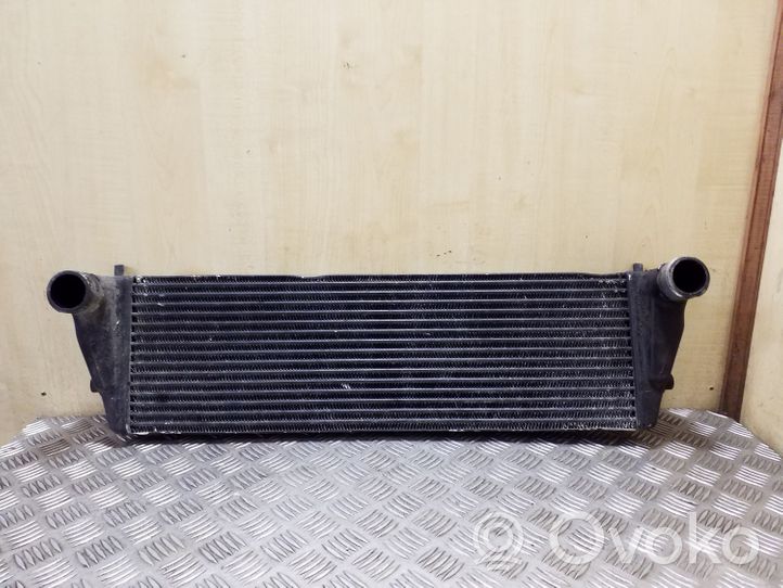 Opel Frontera B Intercooler radiator 97142017