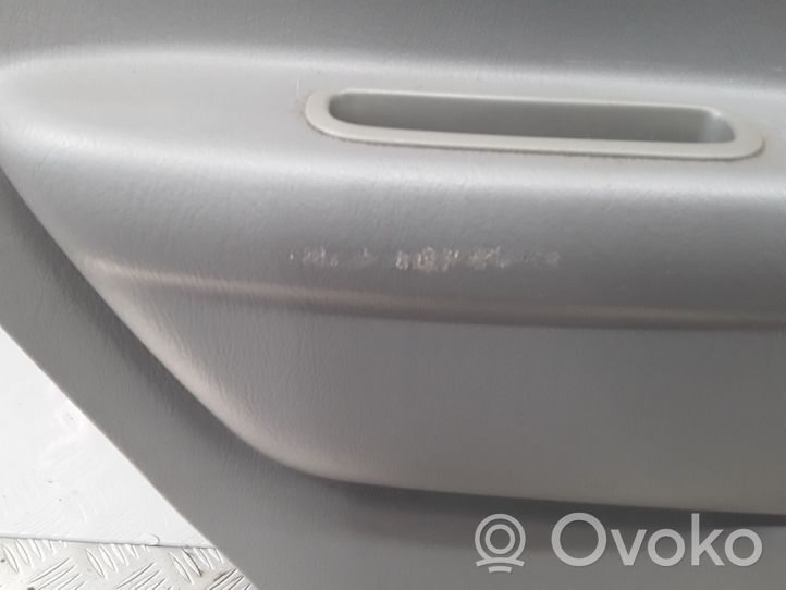 Mazda Demio Garniture panneau de porte arrière D28068550