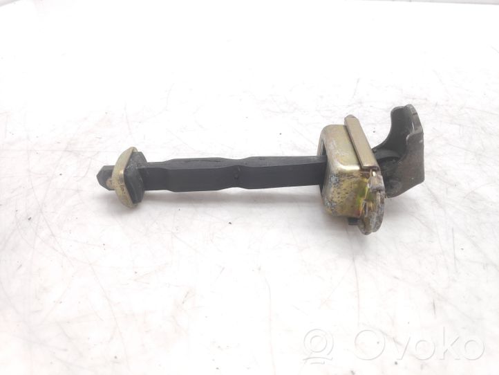 Nissan Primera Front door check strap stopper 