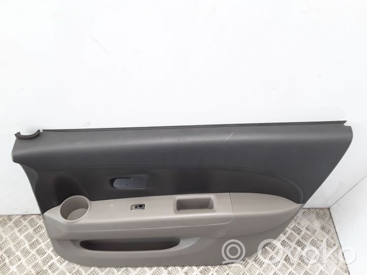 Daihatsu Sirion Rivestimento del pannello della portiera anteriore 67060B1010