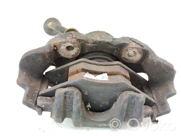 Volkswagen Polo II 86C 2F Front brake caliper 