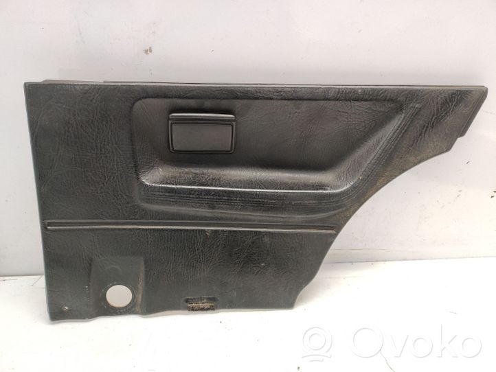 Volkswagen Polo II 86C 2F Rivestimento del pannello della portiera posteriore 867867044