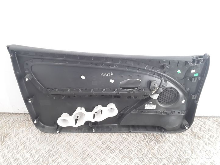 Renault Megane III Garniture de panneau carte de porte avant 809007021R