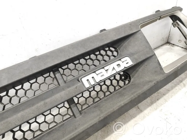 Mazda B series UF Front bumper upper radiator grill 