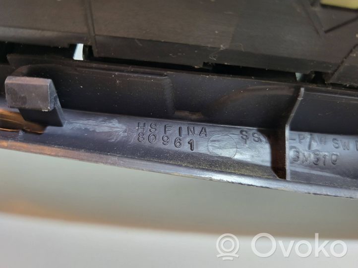 Nissan Almera Tino Rivestimento pulsantiera finestrino della portiera anteriore 80961