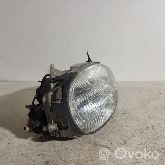 Mazda 121 Headlight/headlamp E290061