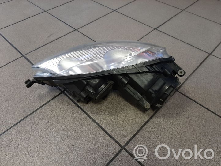 Volkswagen Golf V Lampa przednia 1K6941006P