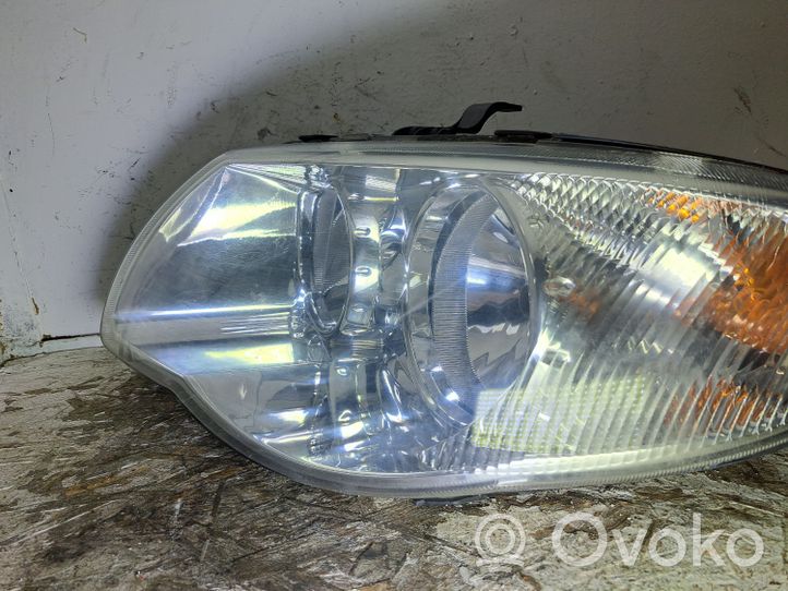 Chrysler Voyager Lampa przednia 084331105L