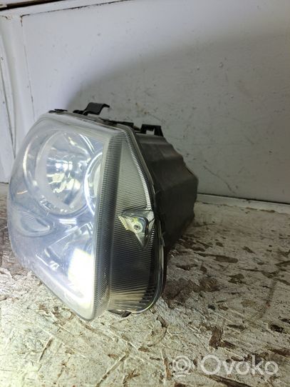 Chrysler Voyager Lampa przednia 04857830AC