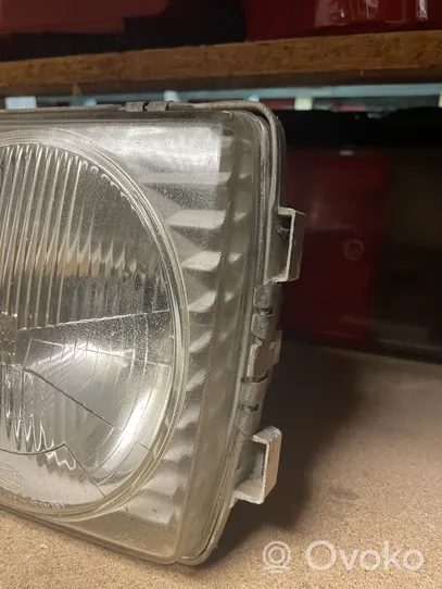 Mercedes-Benz W123 Lampa przednia 117683LI