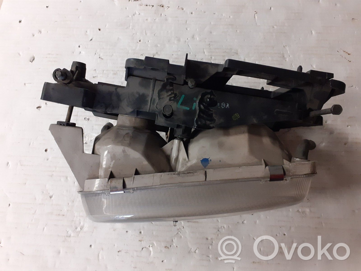 Cadillac Escalade Lampa przednia GM15738657