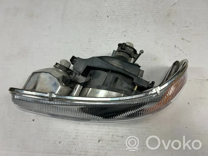 GMC Yukon Headlight/headlamp 10010129