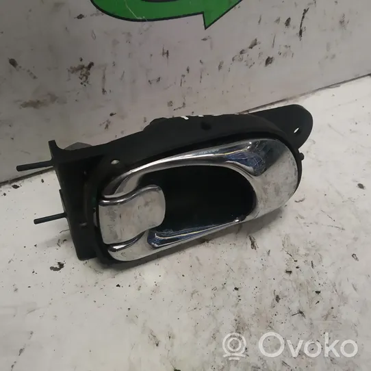 Chevrolet Tacuma Front door interior handle 