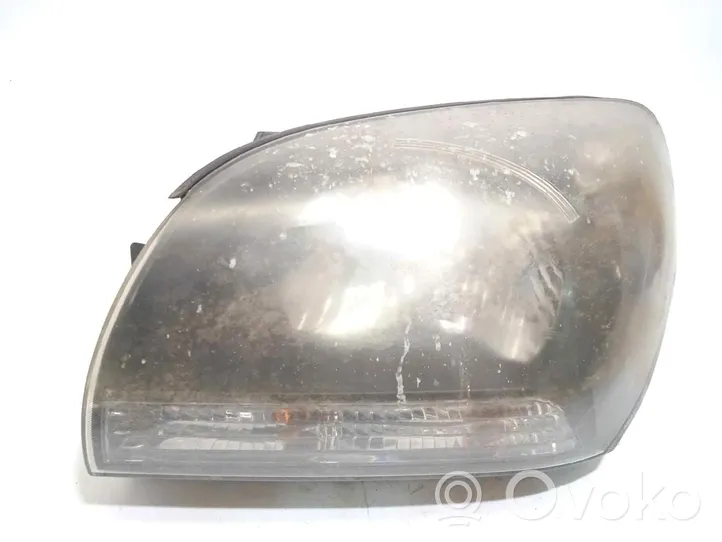 KIA Sportage Lampa przednia 921010Z010