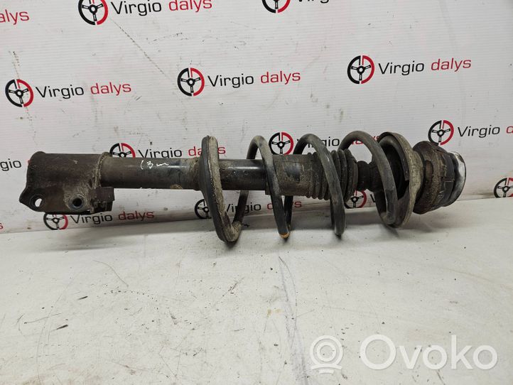 Dacia Logan I Front shock absorber with coil spring 543024989R