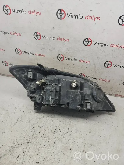 Toyota Corolla E120 E130 Lampa przednia 8115002150