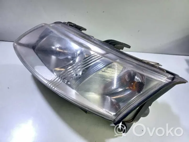 Saab 9-3 Ver2 Lampa przednia 12797388