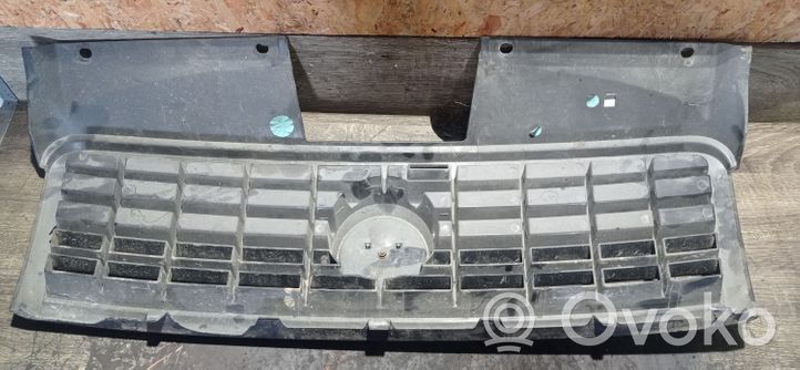 Fiat Doblo Front bumper upper radiator grill 735395576