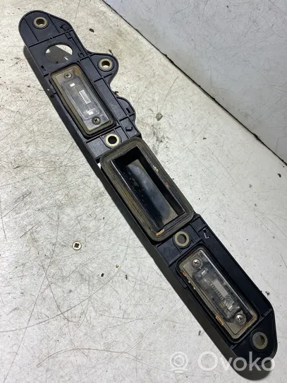 Volkswagen Touran I Trunk door license plate light bar 