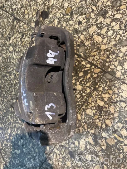 Opel Astra J Caliper de freno delantero 