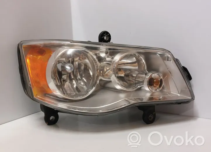 Chrysler Grand Voyager V Lampa przednia 1EJ263060-02